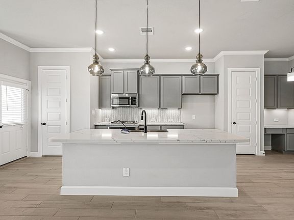 Spectacular gourmet kitchen with large island