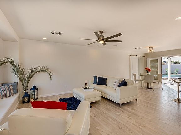 LIVING AREA/DINING/FRENCH DOORS TO POOL
