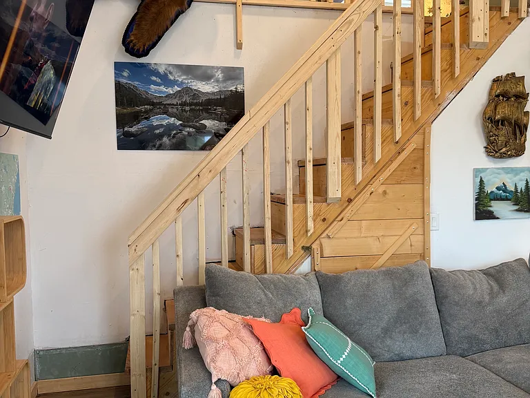 Stairs and view of the loft from below