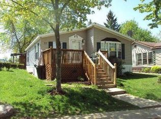 77 Petoskey St, New Hudson, MI