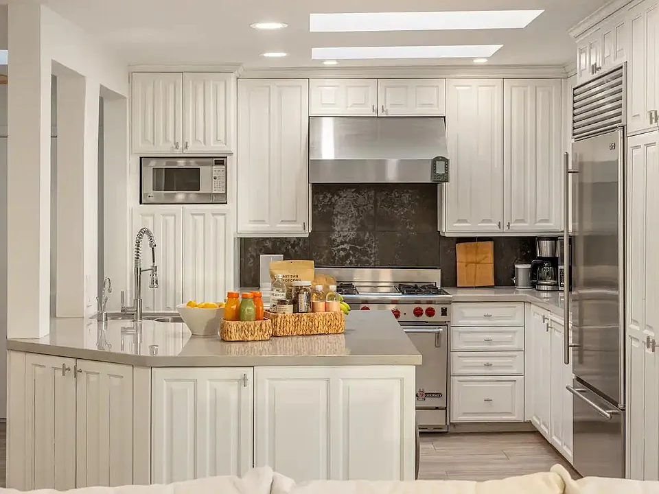 Sleek and stylish, the kitchen invites culinary moments in a modern setting.
