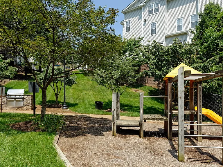 Courtyard greenspace with playground and pathway