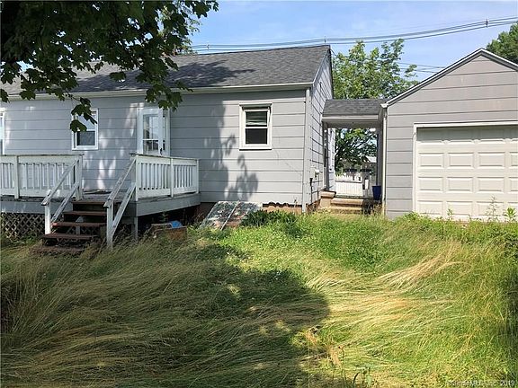 Rear of the home -shows dual garage access.