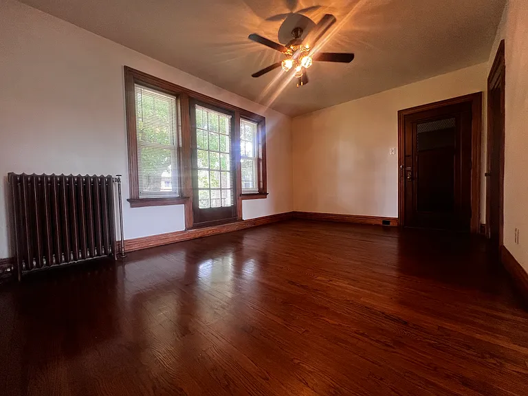 Hardwood flooring throughout.