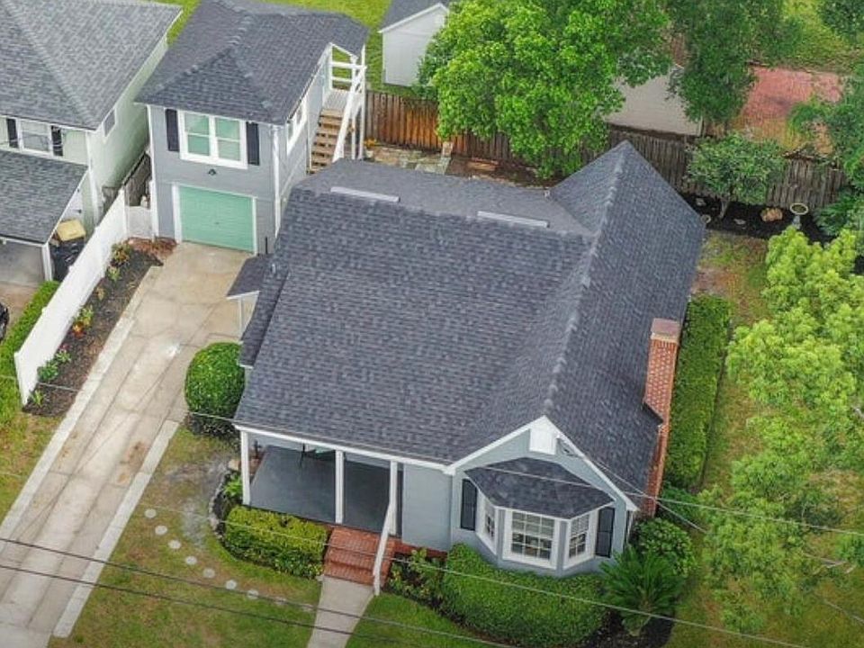 Over view of main house with unit on the back left detached.