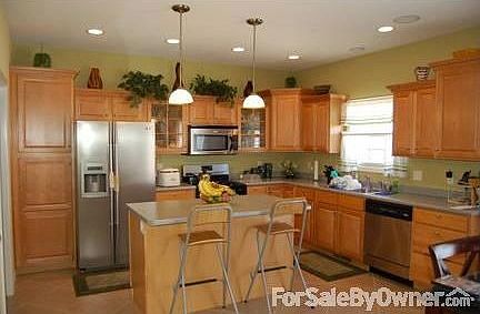 Kitchen
						:
						Stainless steel appliances, 24x24 ceramic tiles, wood cabinets and 5 ft island.