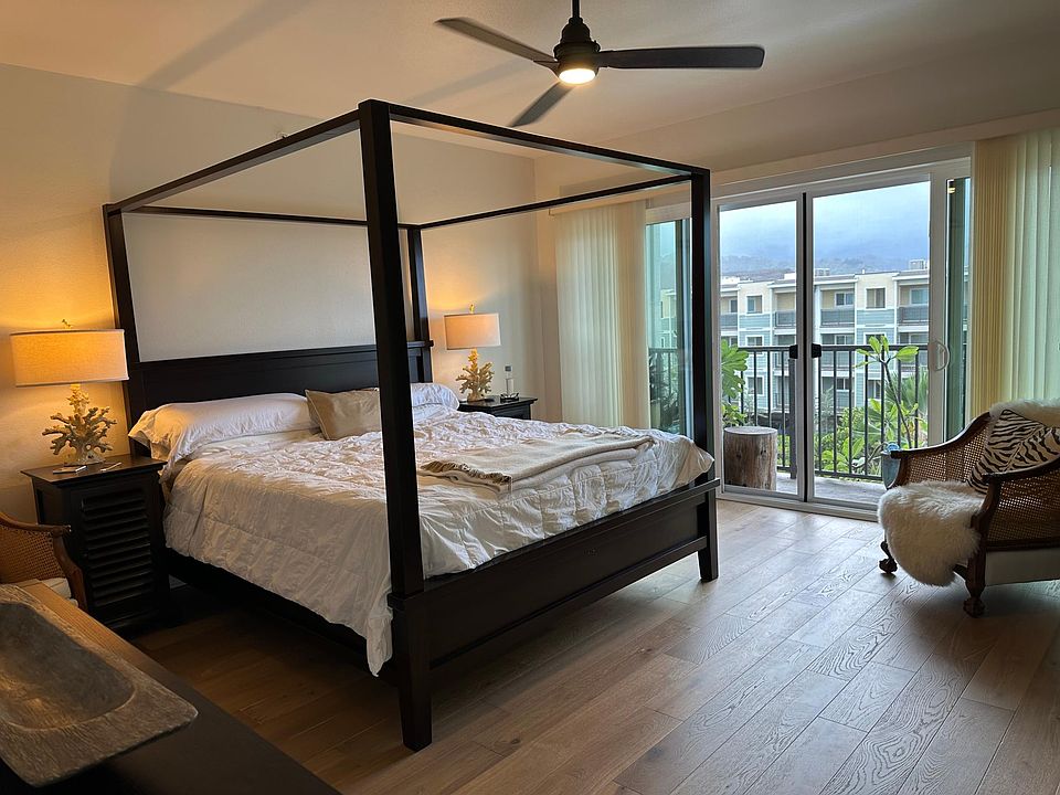 Master bedroom with balcony view of Pali