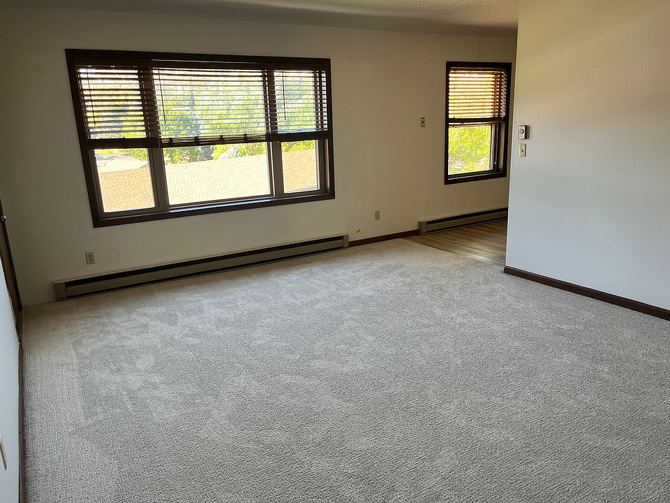 Living room - new carpet, large windows, nice view