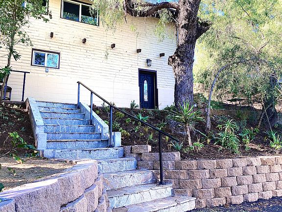 Stairs from parking to front door