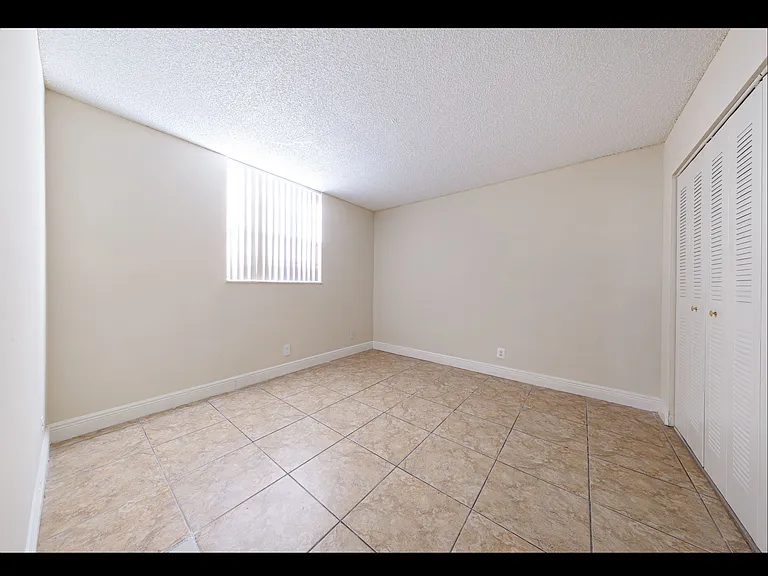 Bedroom & Window | Sunset Palms | Apartments For Rent in Hollywood FL