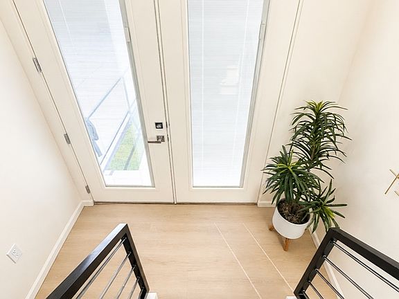 Front doors as viewed from inside the home.