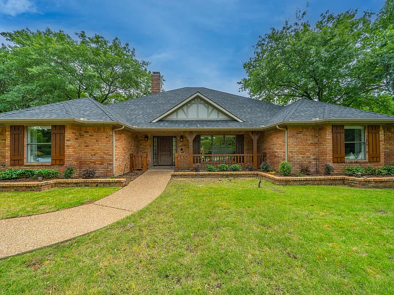 Elegant Brick Estate with Massive Lawn & Professional Landscaping
