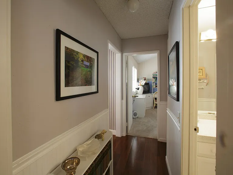Hallway leading to bedroom 1 from bedroom 2