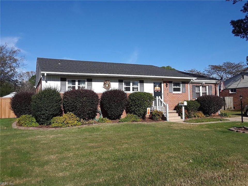 Front with landscaped garden