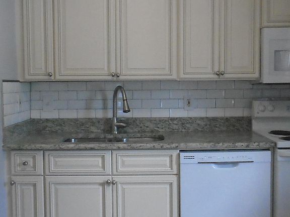 Kitchen with Granite Counter tops and High-end solid wood