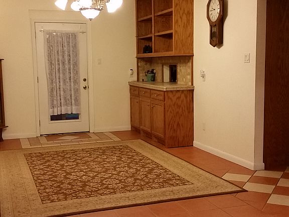 Dining area w/oak buffet
