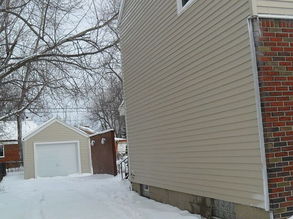 Garage has new siding, roof, gutters & door