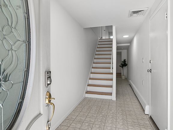 ENTERANCE FOYER FROM GARAGE DIRECT ACCESS