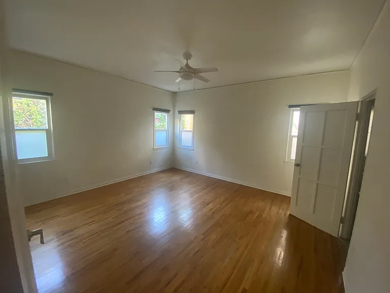 Primary bedroom with walk-in closet