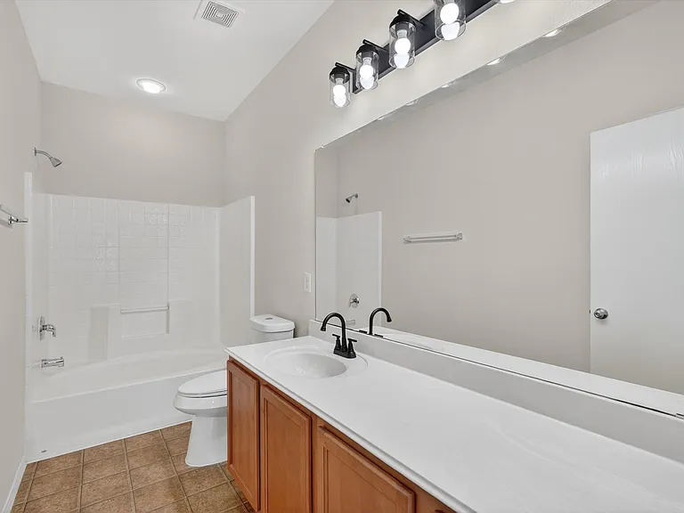 7401 Cowhand Ct — Photo 25