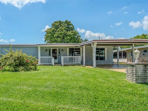 1021 HILLTOP ROAD, TAVARES, FL 32778