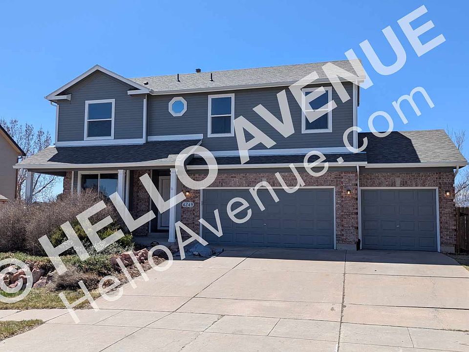 Beautify front yard, with private front porch, 3 car garage and a large driveway