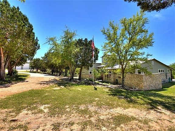 Circular drive with access to the home and the 2500 square foot, newly built shop.