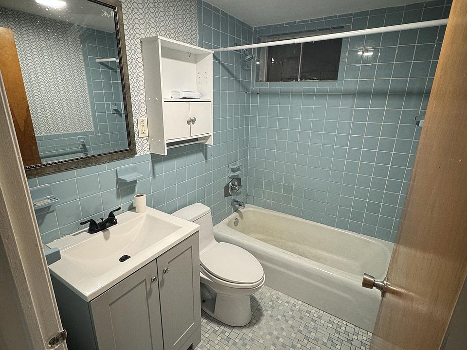 Newly renovated bathroom with fresh vanity
