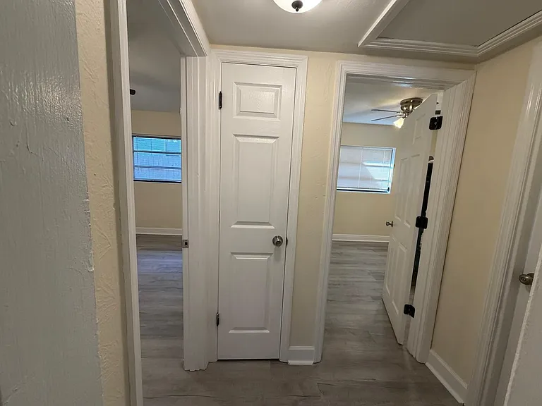 Closet space in each bedroom plus 2 additional hallway closets. New flooring throughout gives a relaxing and fresh interior.