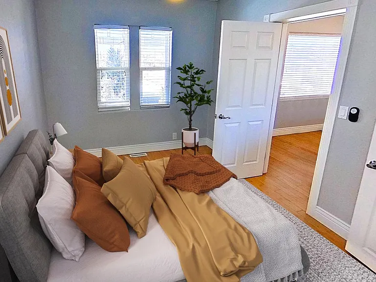 Bedroom 2. This image shows a virtually furnished space. Bedrooms come unfurnished.