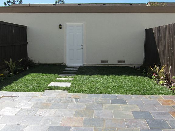 Fresh grass and plants. New sprinkler system.