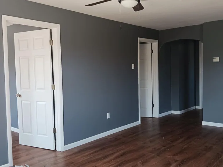 living room & doors to bedroom 3 & 2