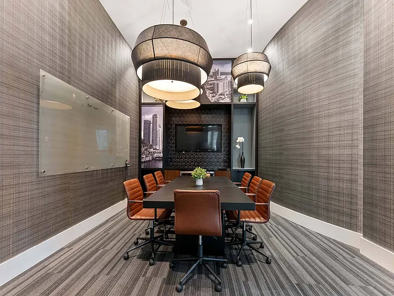 Meet, plan, and create in a modern conference room designed for productivity with comfortable seating and seamless connectivity