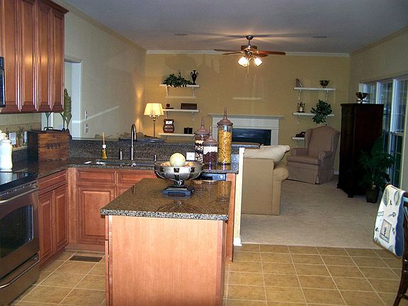 42"H maple glazed cabinets w/ granite ctrtps 