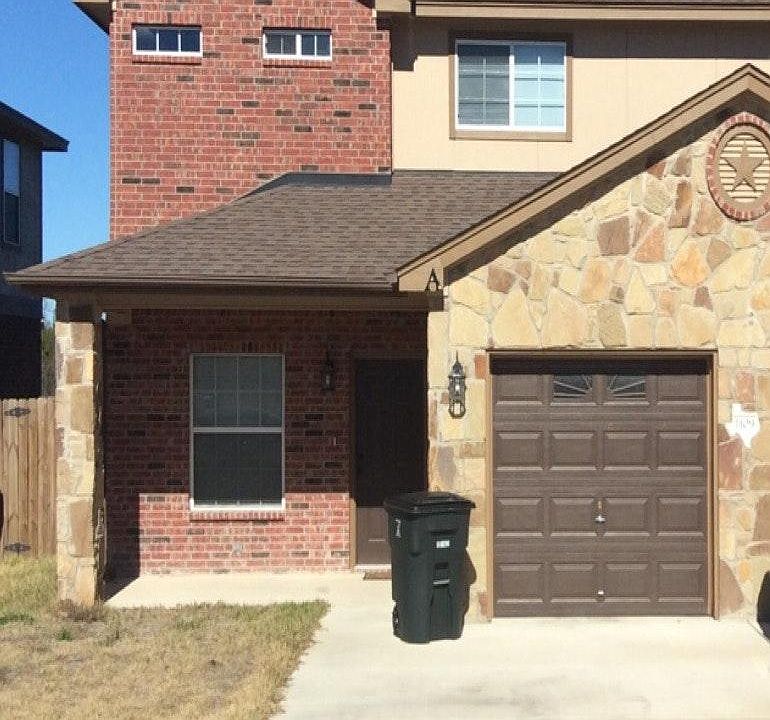 Curb side view of Townhome