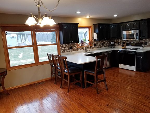Kitchen has Hardwood floors