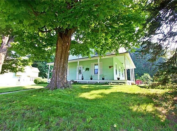 Raised up on Spring Street this stately colonial knows its own beauty.