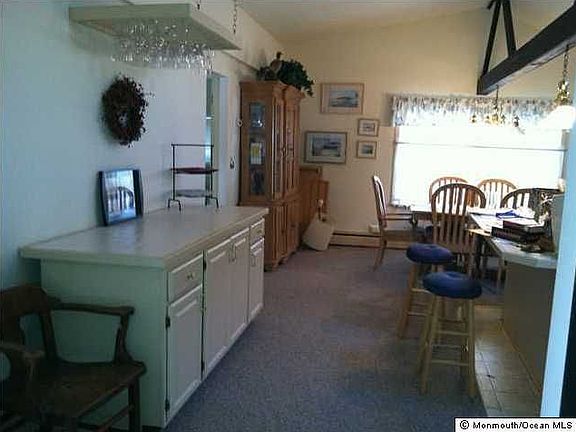 Open floor plan and center island in kitchen
