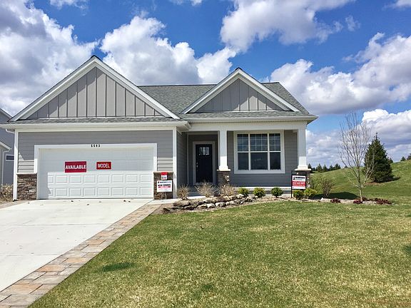 Prime site with upgrade landscape package includes pavers alone driveway