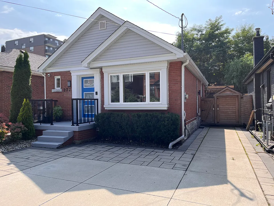 Front view of house featuring 2 reserved parking spaces in driveway