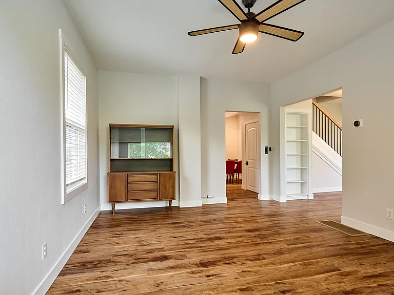 Family Room to Kitchen (left opening) and to front Room (right opening)