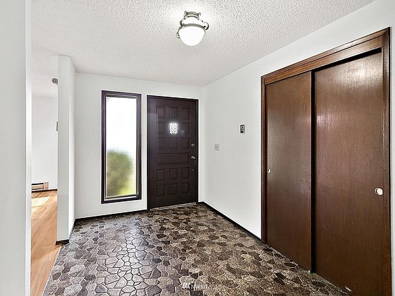 Large entry with coat closet.