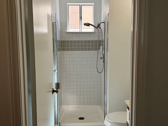 First Floor SHOWER/TOILET on your right as you enter from garage.