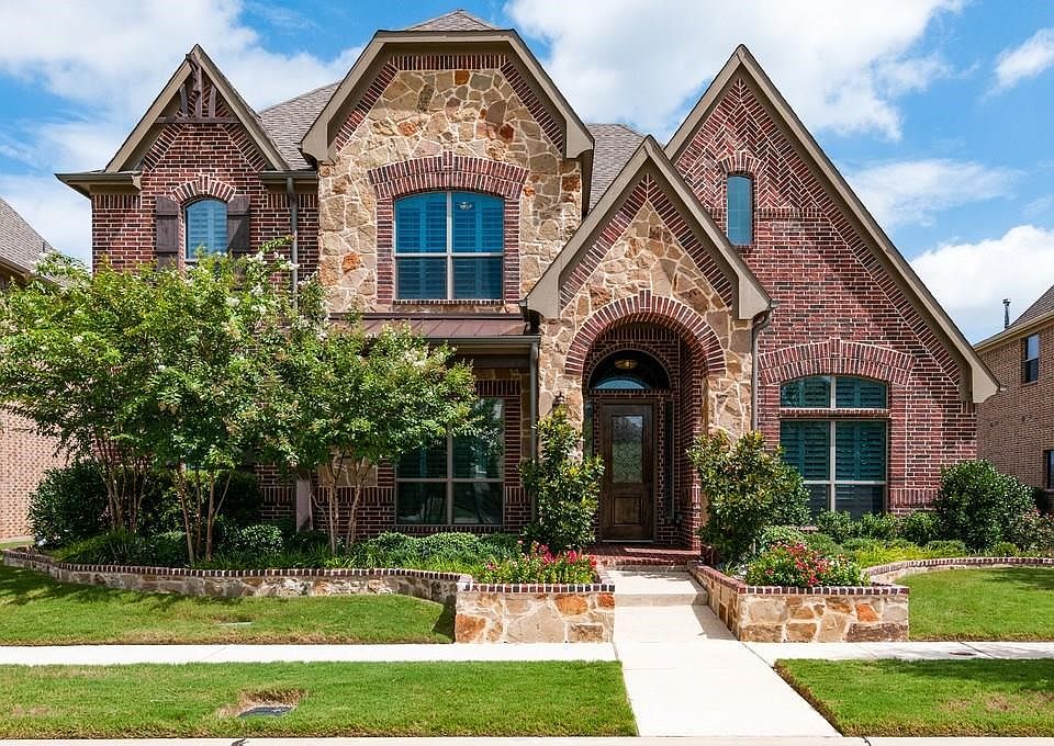 408 Orleans Dr. - Beautifully landscaped custom blt home loaded w upgrades - HOA maintains front & side lawns