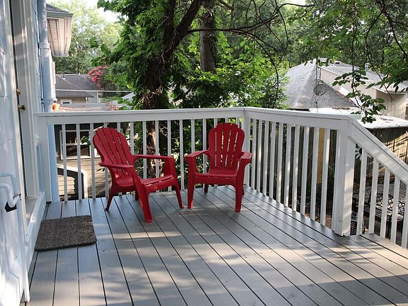 Open Unit 3's kitchen door and enjoy the wonderful deck, nature, trees, birds and being in a safe, cozy neighborhood.