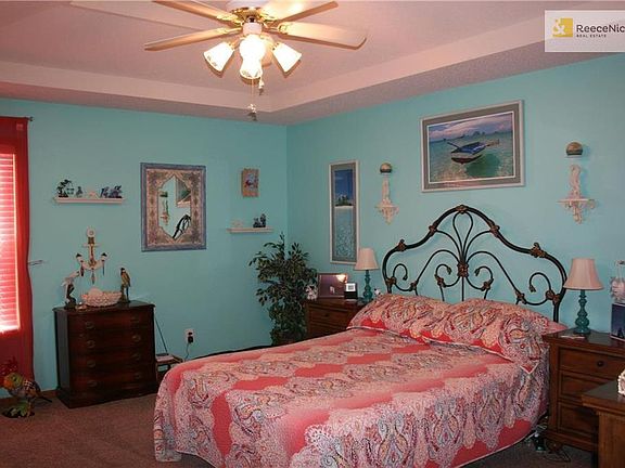 Dining room with a view of the backyard through the sliding glass doors that steps out onto the back deck.