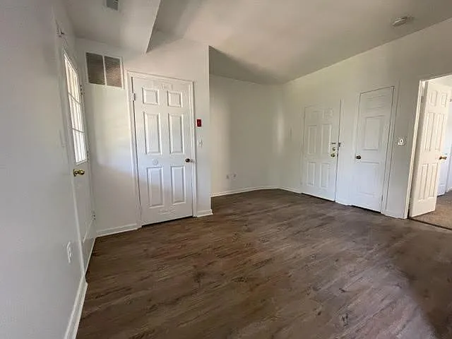 living area with new vinyl plank flooring
