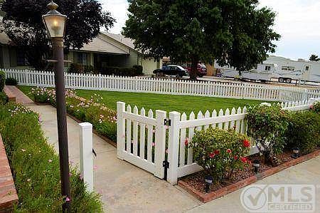 Cute front gate that says Welcome Home.