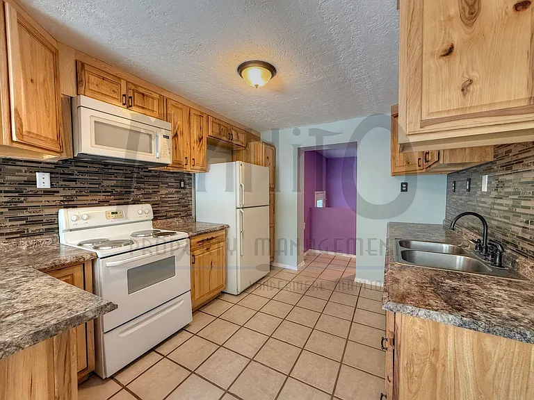 3642 W Wellesley Ave — Photo 6
