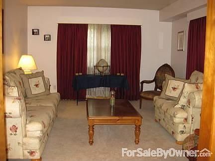 Living Room
						:
						Enjoy a good book or entertain guests in the stylish living room